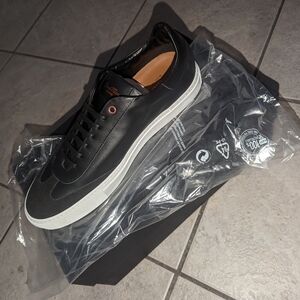 Good Man's shoes by Russell Wilson